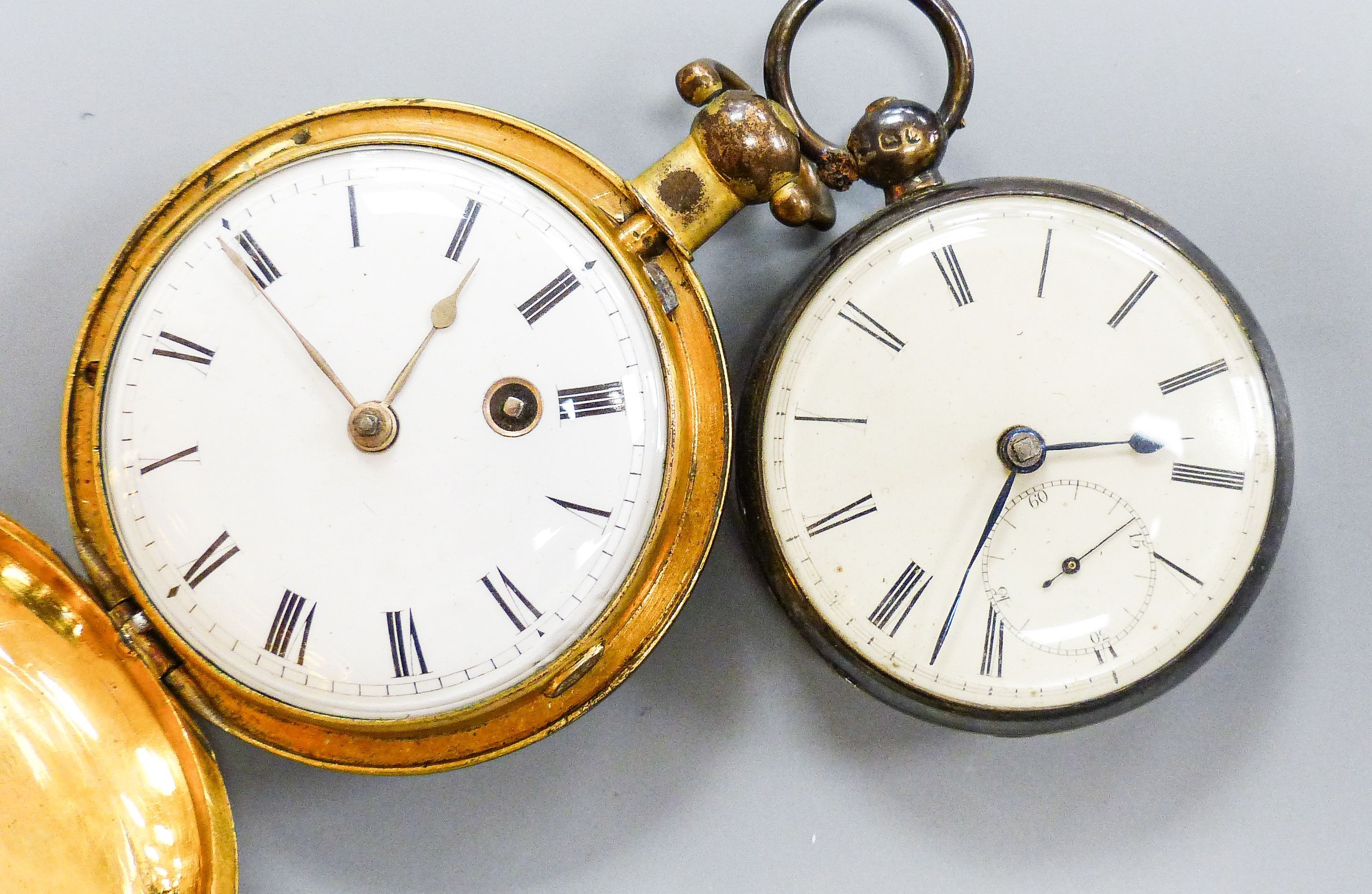 A 19th century engine turned gilt metal hunter verge pocket watch, by Johnson of London, case diameter 52mm, together with a Victorian silver open face pocket watch.